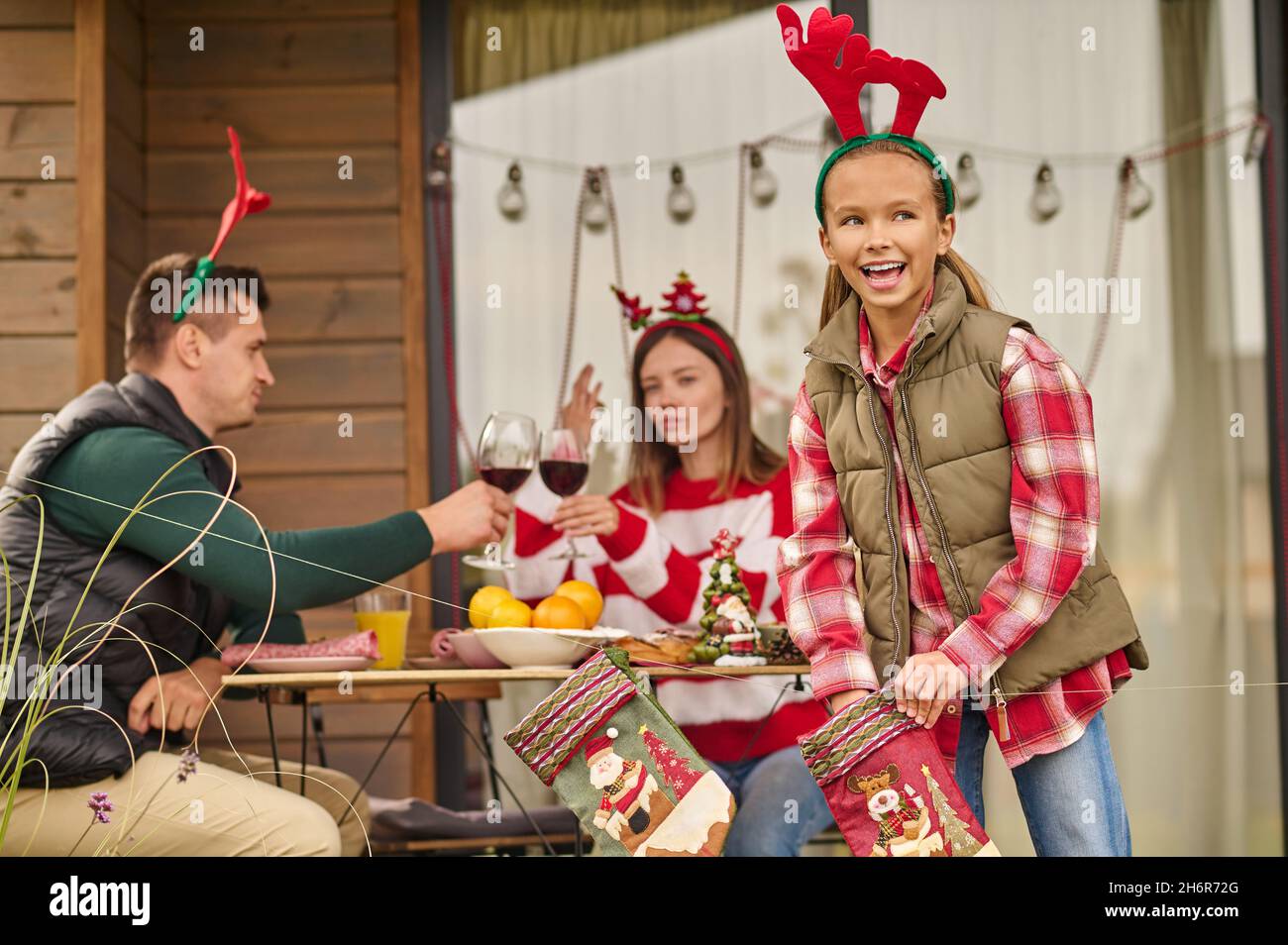 A famly celebrating christmas in a country house Stock Photo