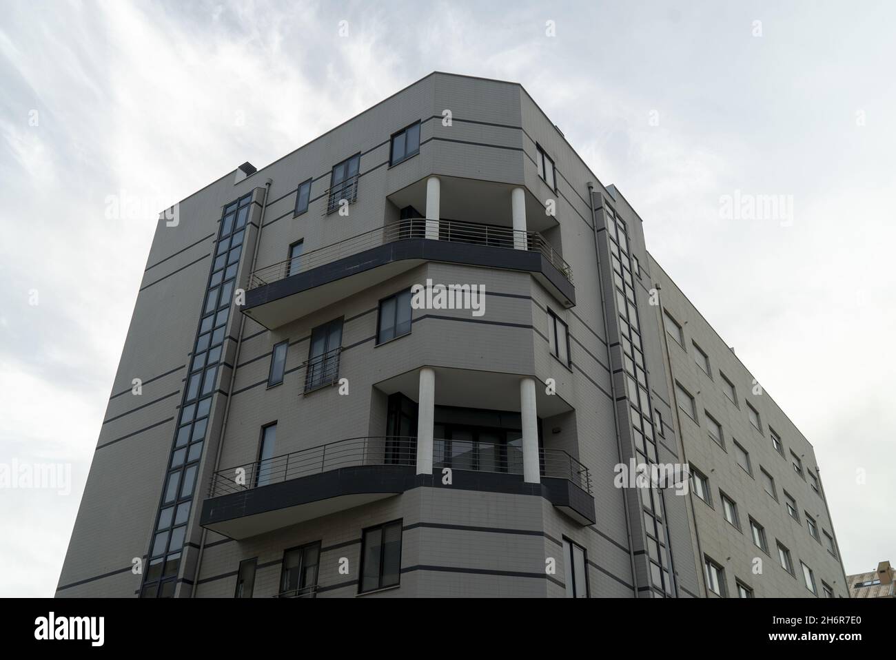 Low angle of a building with balconies on a sunny day Stock Photo - Alamy