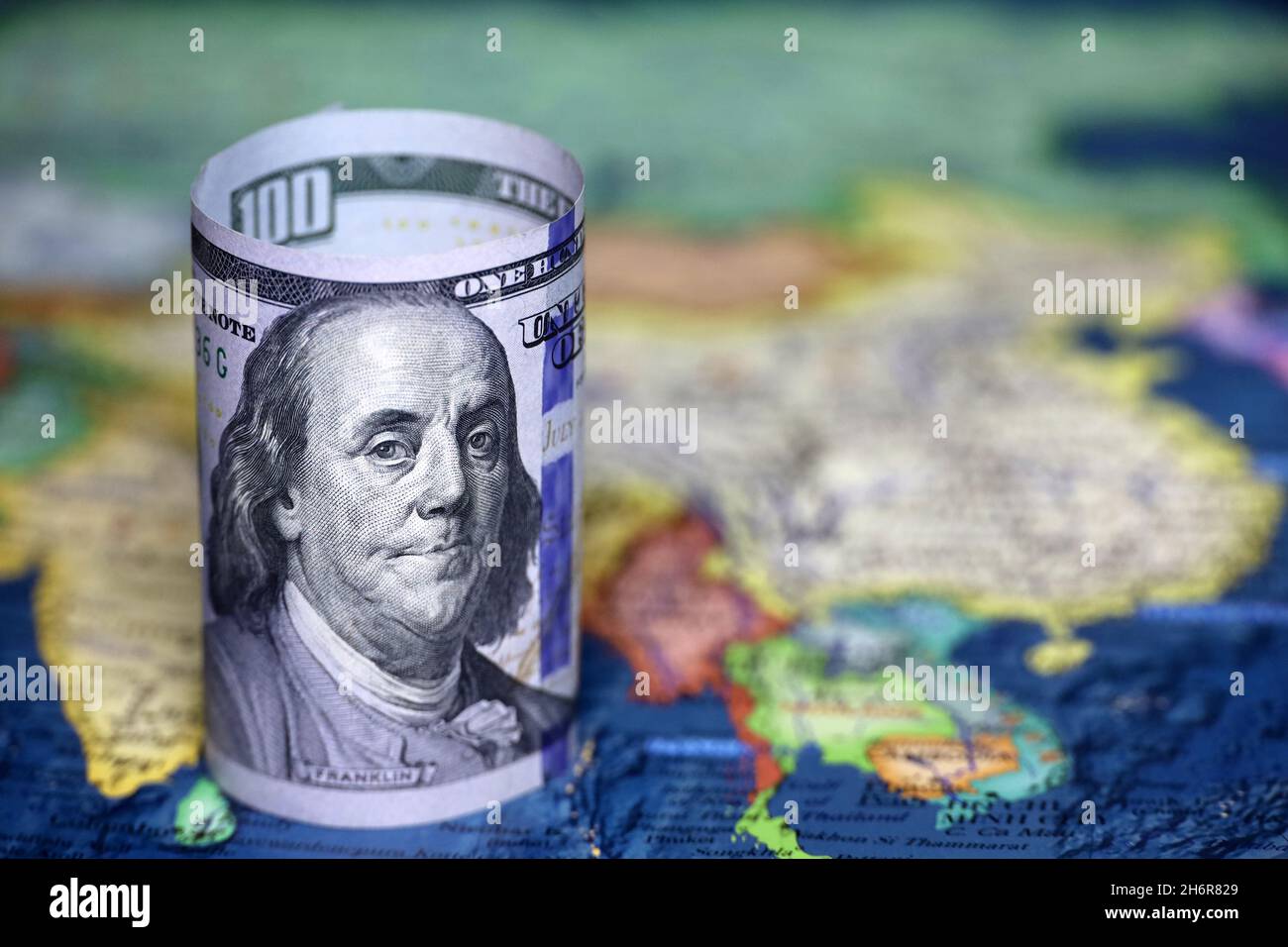 US dollar on the map of South-East Asia. American investment and trading with India, China and other asian countries, concept of american policy Stock Photo