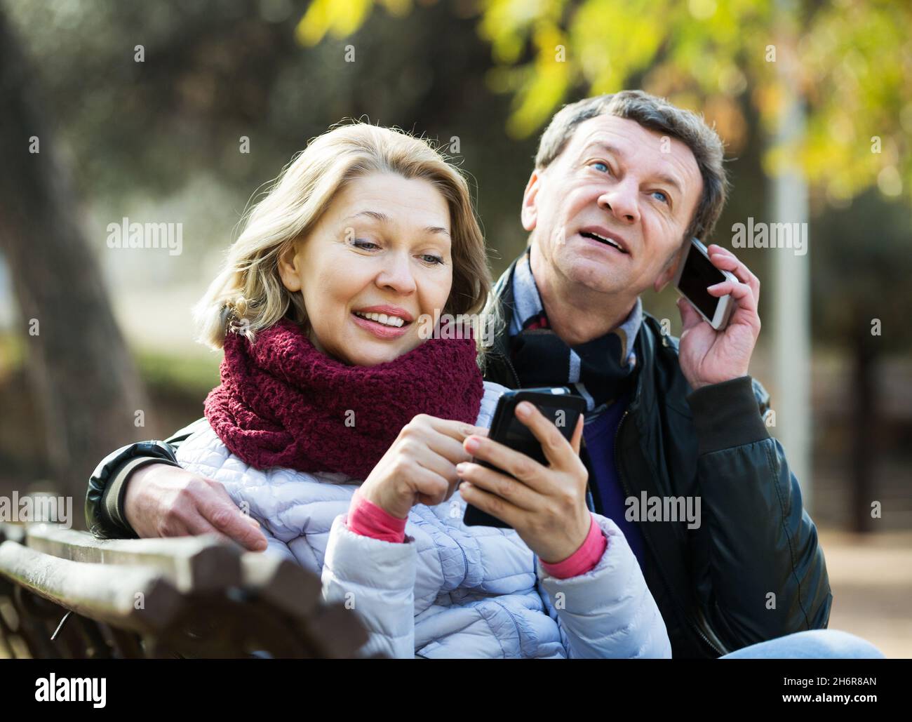 Couple with mobile phones Stock Photo