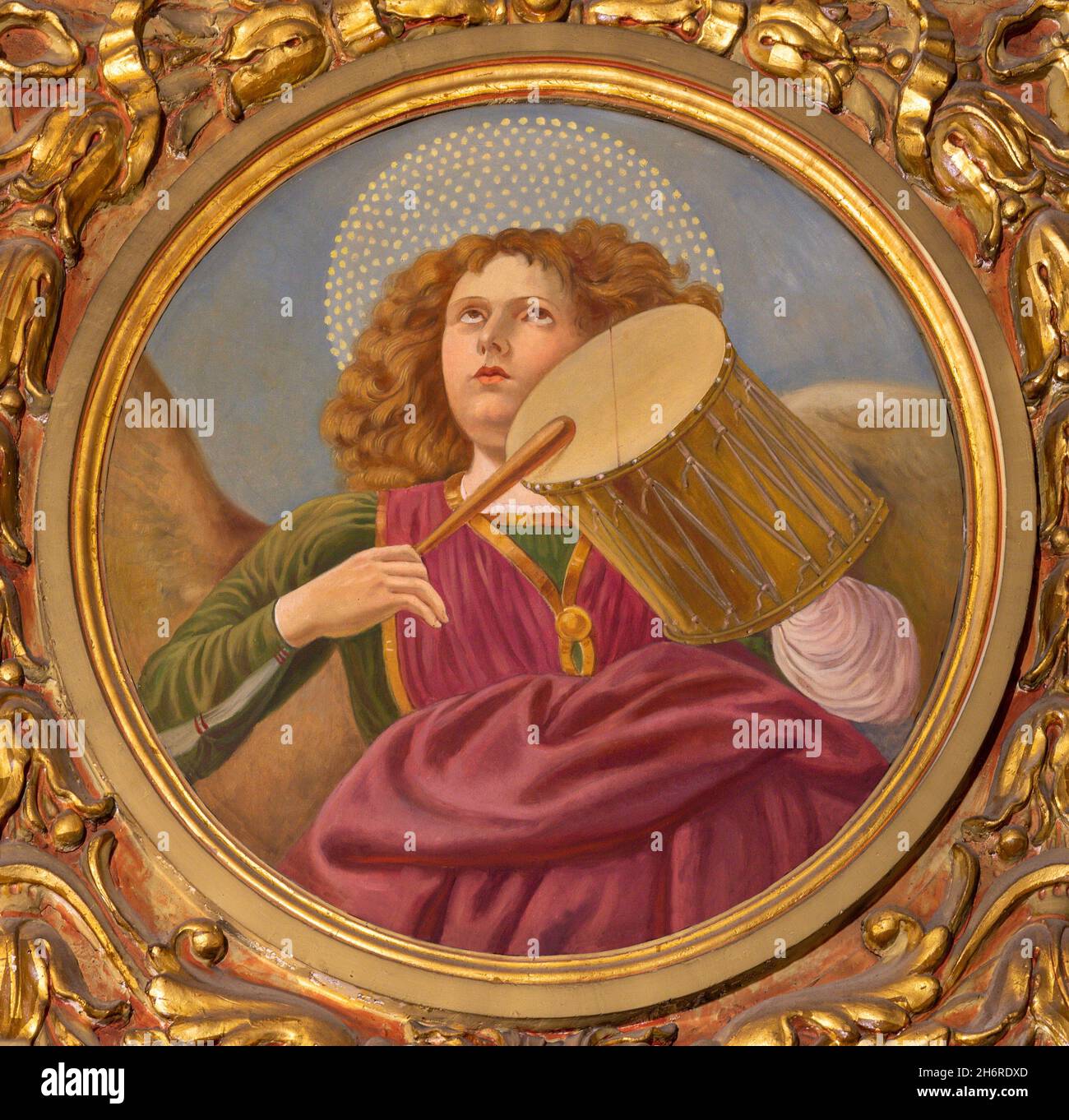 FORLÍ, ITALY - NOVEMBER 11, 2021: The fresco of angel with the drum in the Cattedrala di Santa Croce by Giovanni Secchi (1876 - 1950). Stock Photo