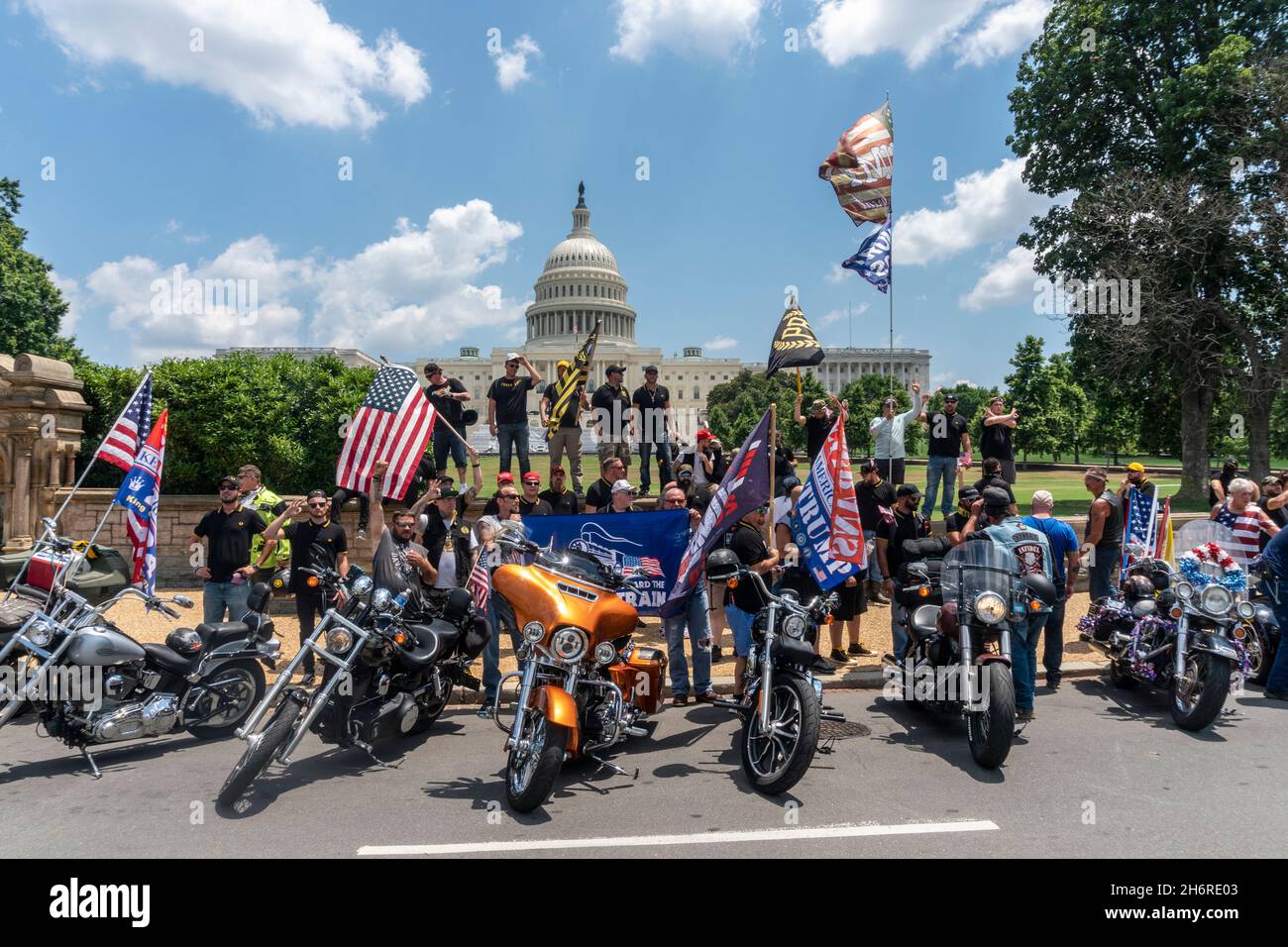 Members of the Proud Boys and a motorcycle group pose for a photo in front of the US Capitol building in Washington DC on 4th July, 2020. Credit: Rise Images/Alamy Stock Photo