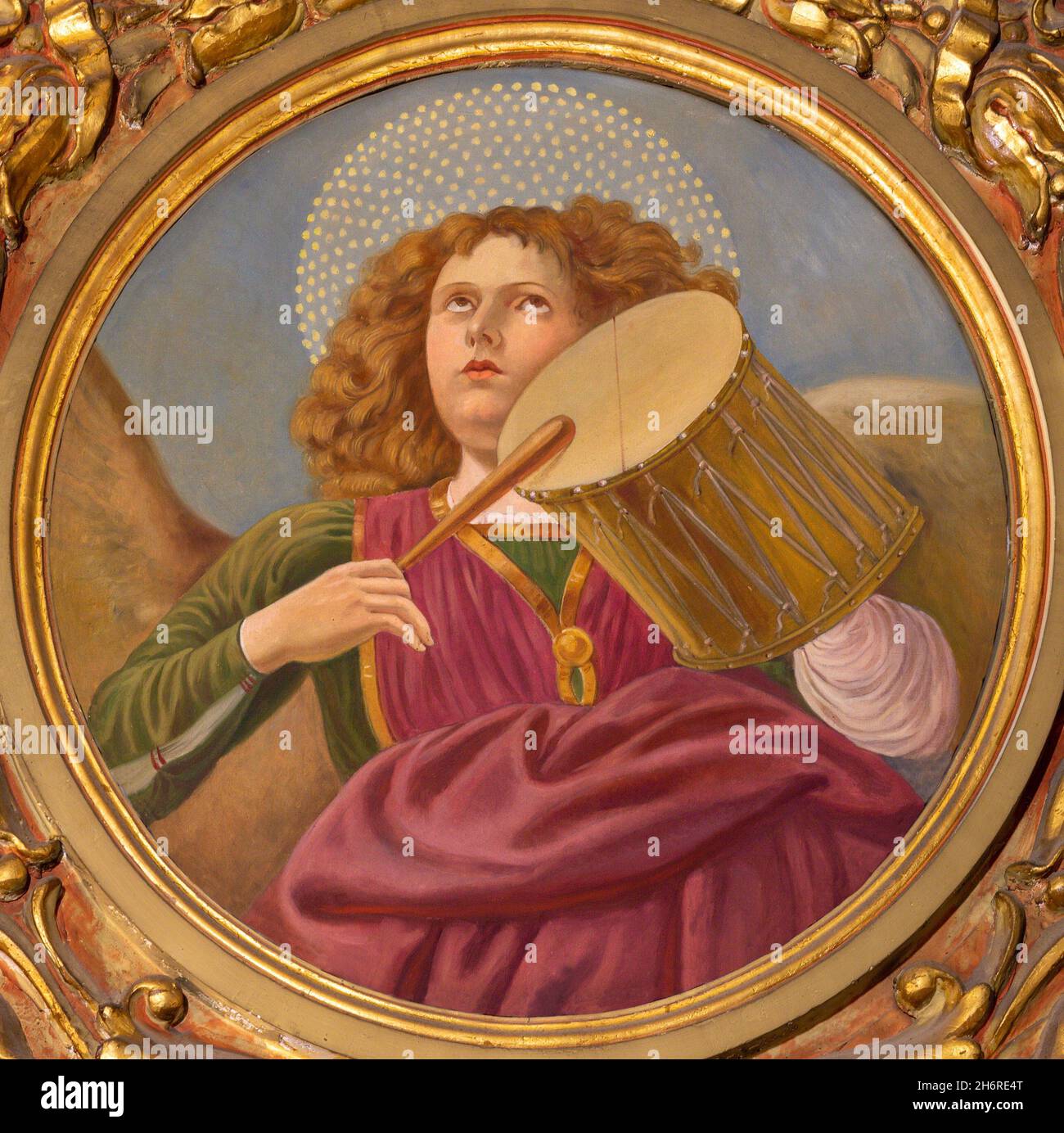 FORLÍ, ITALY - NOVEMBER 11, 2021: The fresco of angel with the drum in the Cattedrala di Santa Croce by Giovanni Secchi (1876 - 1950). Stock Photo