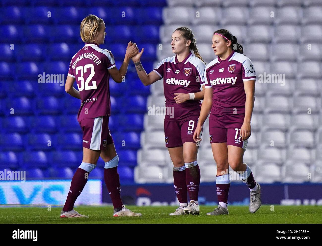 West Ham United's Claudia Walker (centre) celebrates scoring their side's second goal of the game with teammates Dagny Brynjarsdottir (left) and Melisa Filis during the Continental Women's League Cup group E match at St. Andrew's, Birmingham. Picture date: Wednesday November 17, 2021. Stock Photo