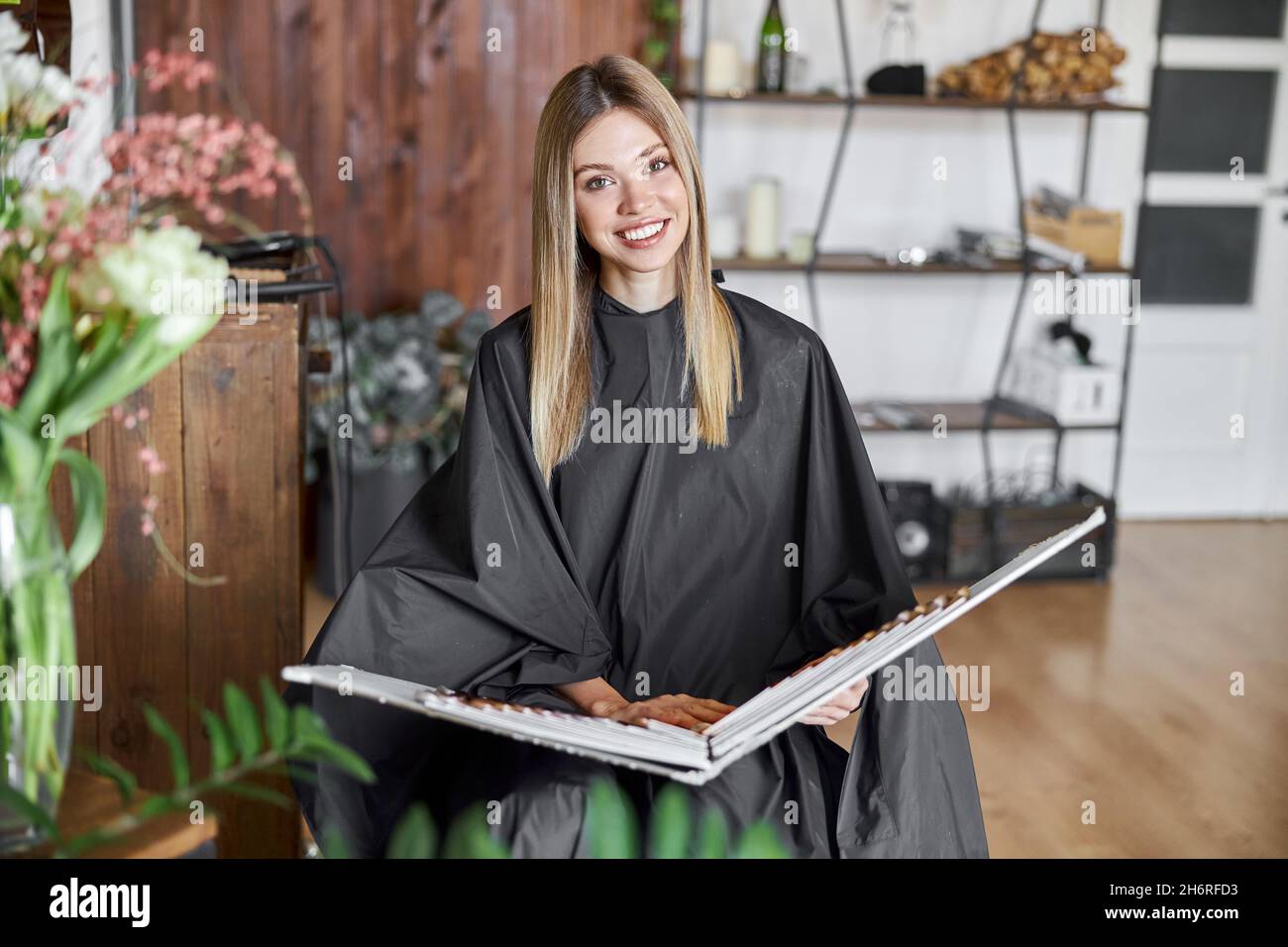 Happy beautiful light hair caucasian woman at beauty salon Stock Photo