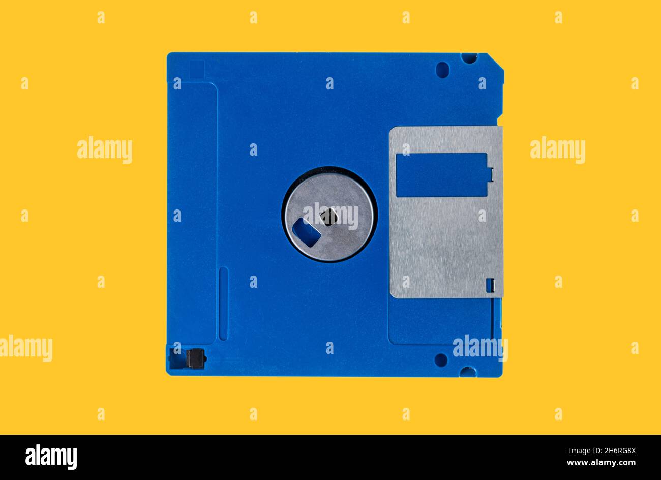Blue Floppy disk isolated on yellow background, clipping path Stock Photo
