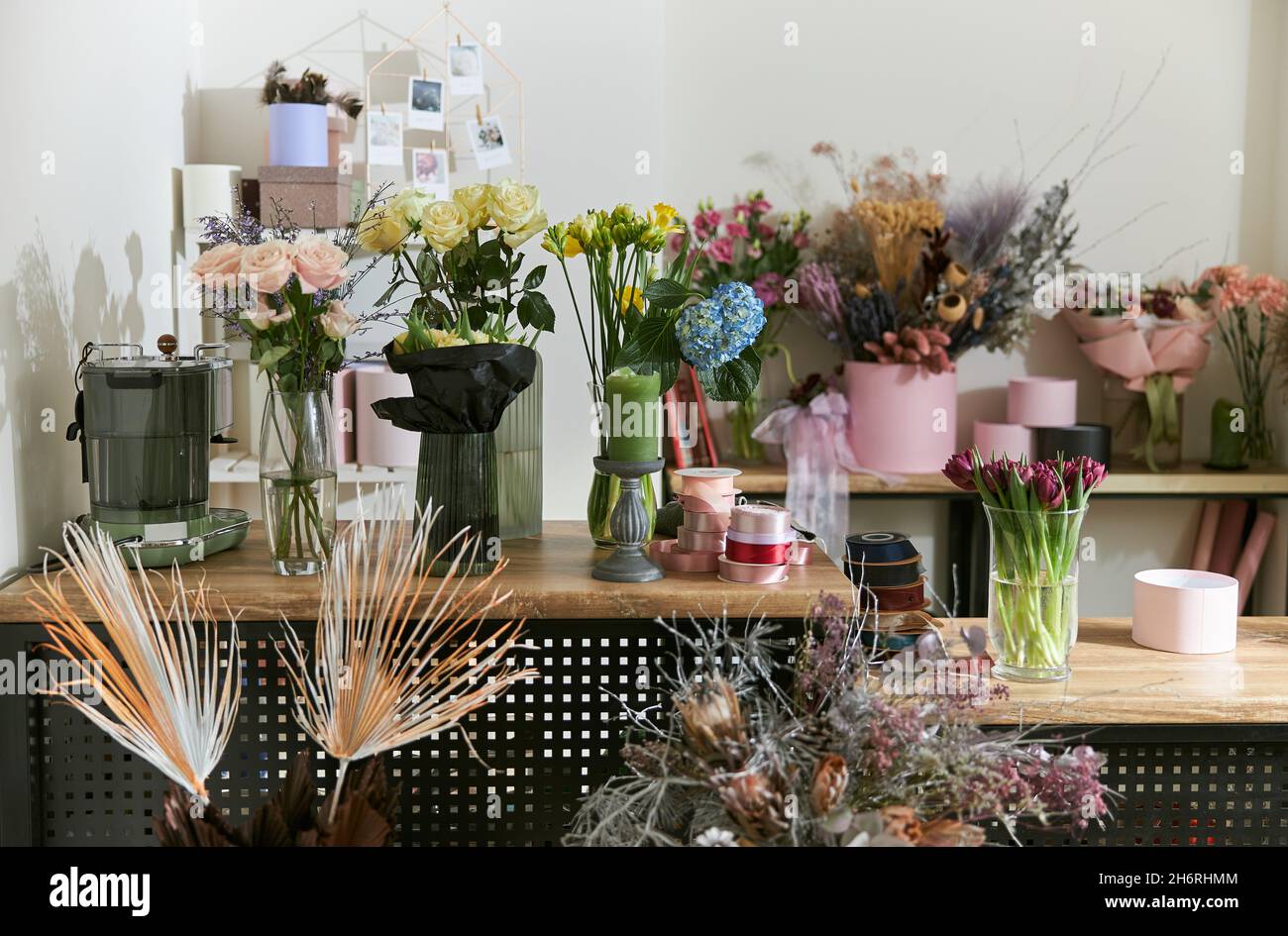 Flowers and bouquets at modern light flower shop Stock Photo