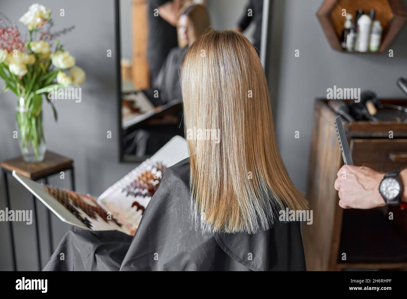 Happy beautiful light hair caucasian woman at beauty salon Stock Photo