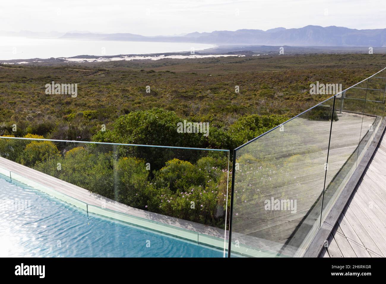 A terrace overlooking a green shrub fynbos landscape Stock Photo