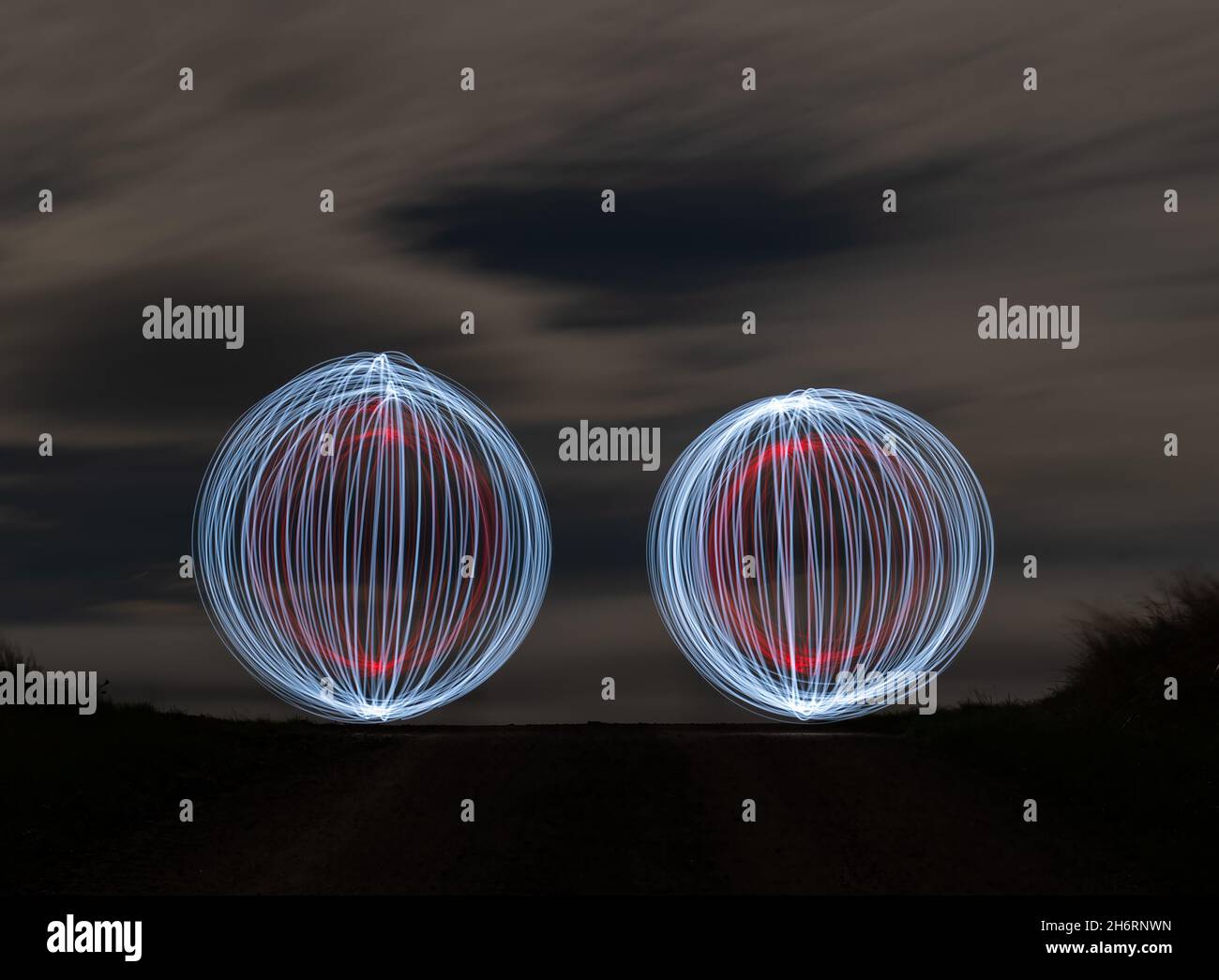 Scotland, United Kingdom, 17th November 2021. Light painting at night: the dark Winter nights offer an opportunity to experiment with light painting with the night sky lit up by moonlight Stock Photo