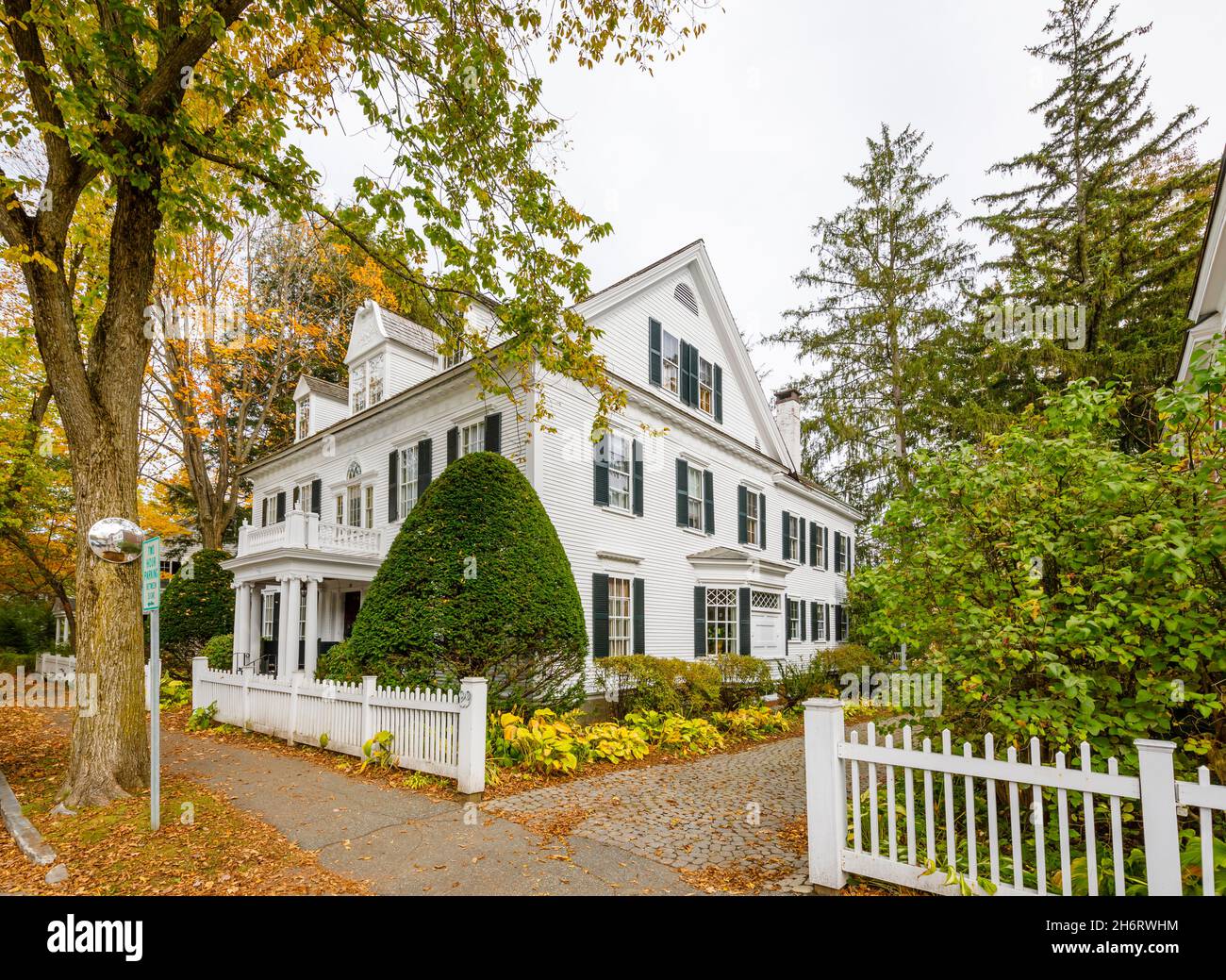 Typical local style large white clapboard faced house in Woodstock, Vermont, New England, USA Stock Photo