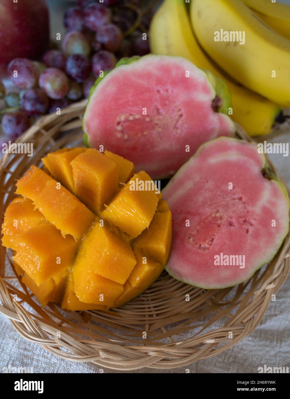 Exotic fruits of Cyprus, fresh ripe pink guava, yellow juicy mango