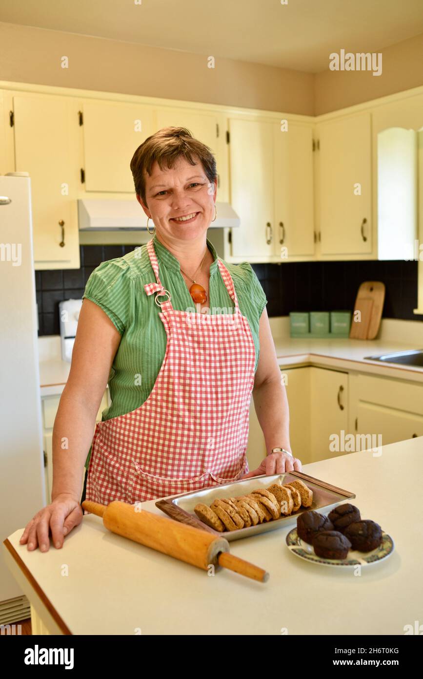 Baker wearing apron hires stock photography and images Alamy