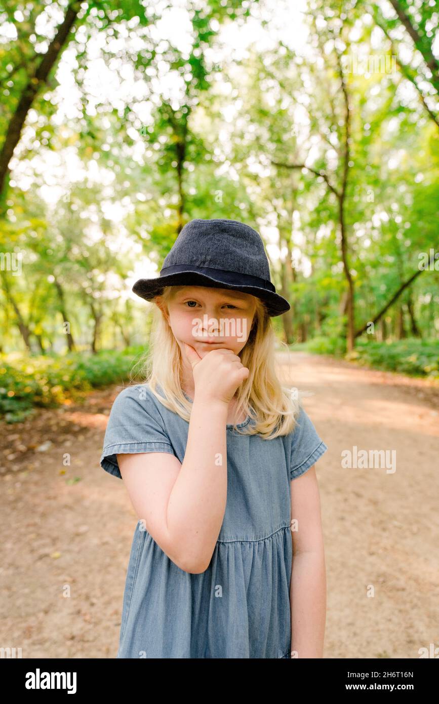 Funny portrait of a young girl making a silly face Stock Photo