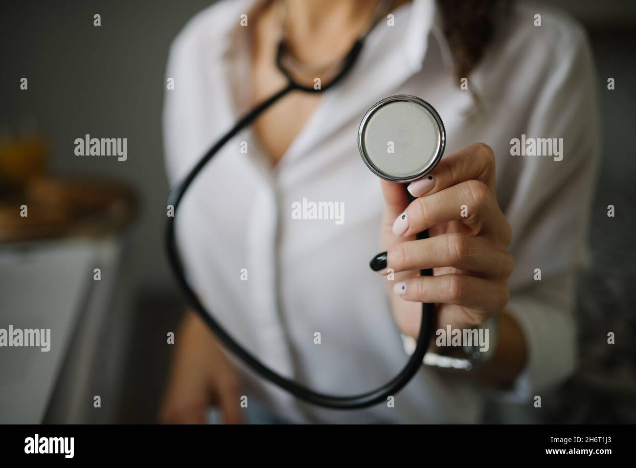 Woman stethoscope up close hi-res stock photography and images - Alamy