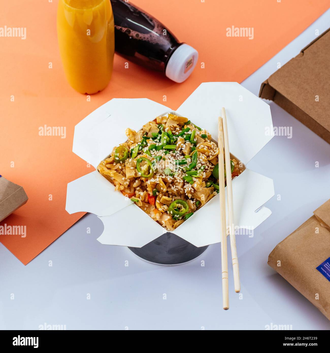 chinese rice noodles with chicken and vegetables in a takeaway box Stock Photo Alamy