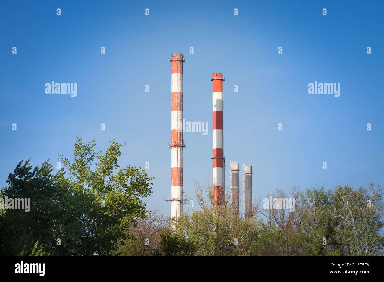 Picture of the panorama of an industrial landscape, taken in belgrade, Serbia. Typical devices like chimneys, plants, factories are visible Stock Photo