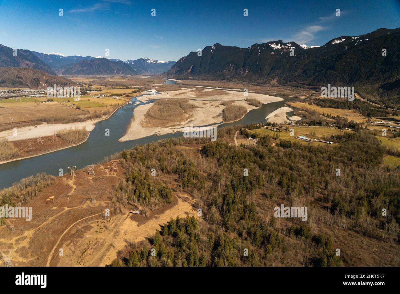 View of the Fraser River Valley with Herrling island and mount Cheam on the background, close to Bridal Falls and Island 22 provincial park. Stock Photo