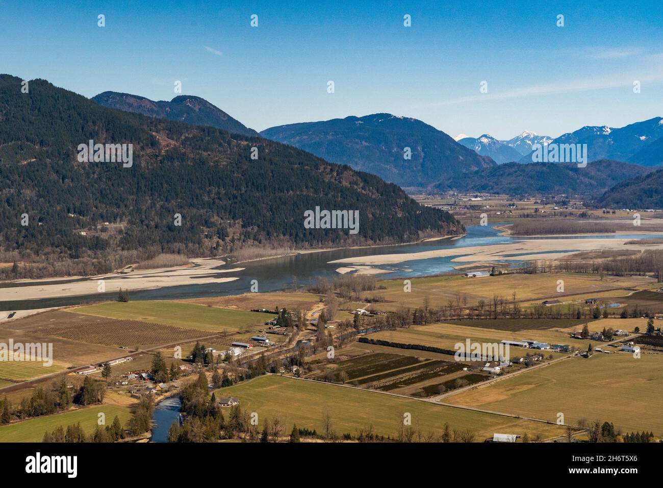 Farmlands in the Sumas Prairie showing the dykes that protect the area from the waters of the Fraser River Stock Photo