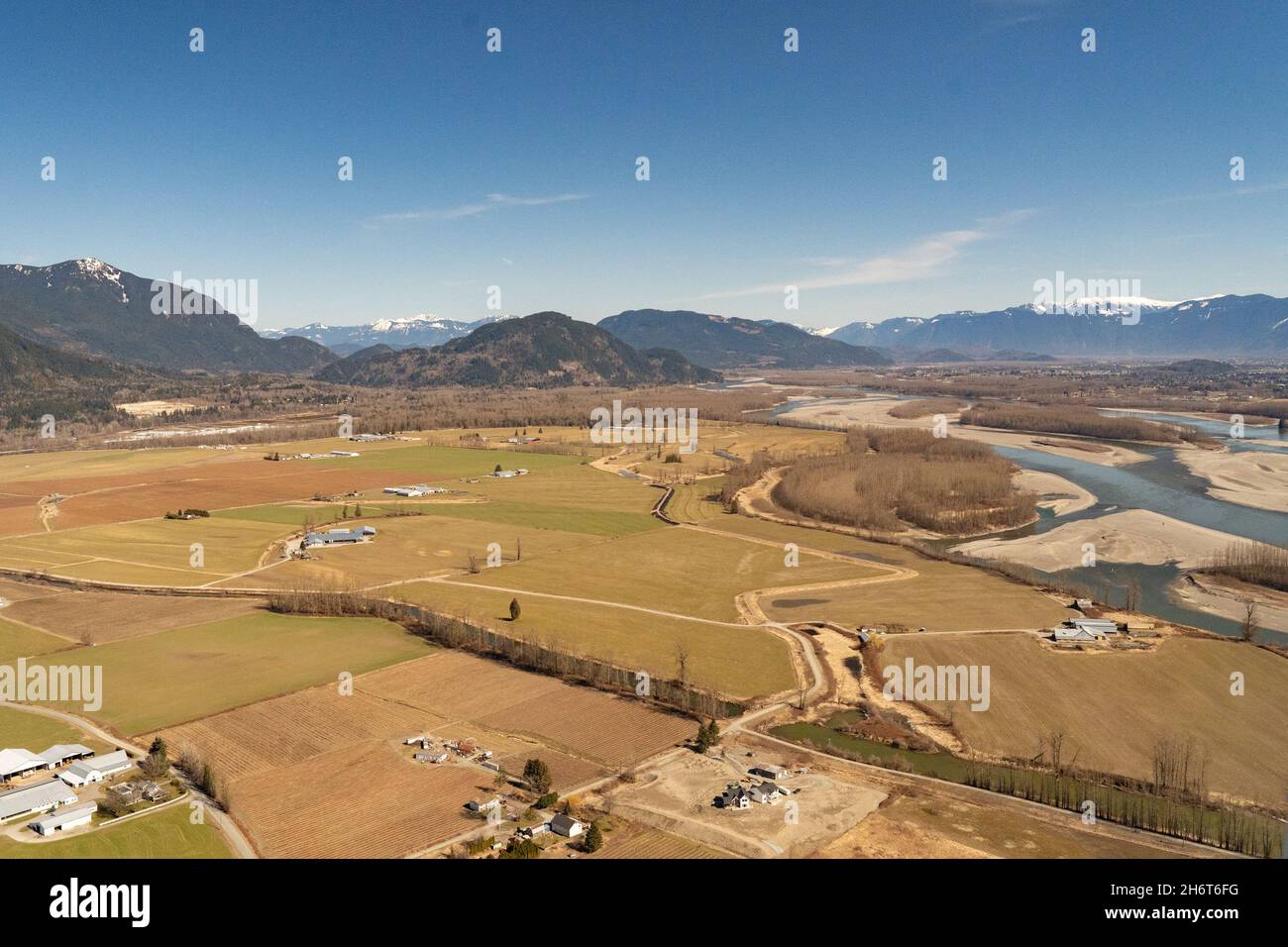 Farmland in the lower Fraser River Valley in the city of Chilliwack British Columbia, Canada. Stock Photo