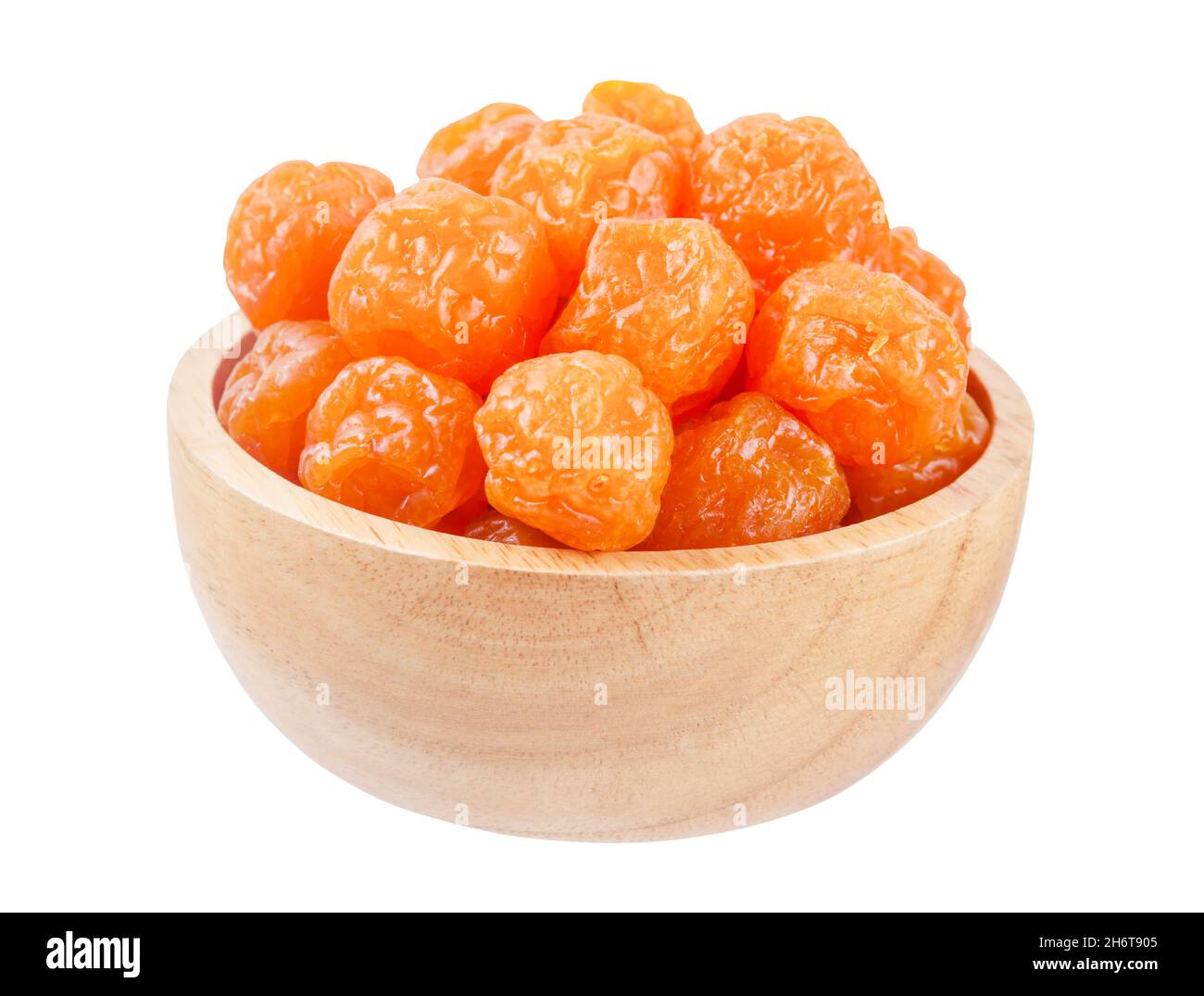 Dried prunes fruits (Preserved fruits Chinese plum) in wooden bowl
