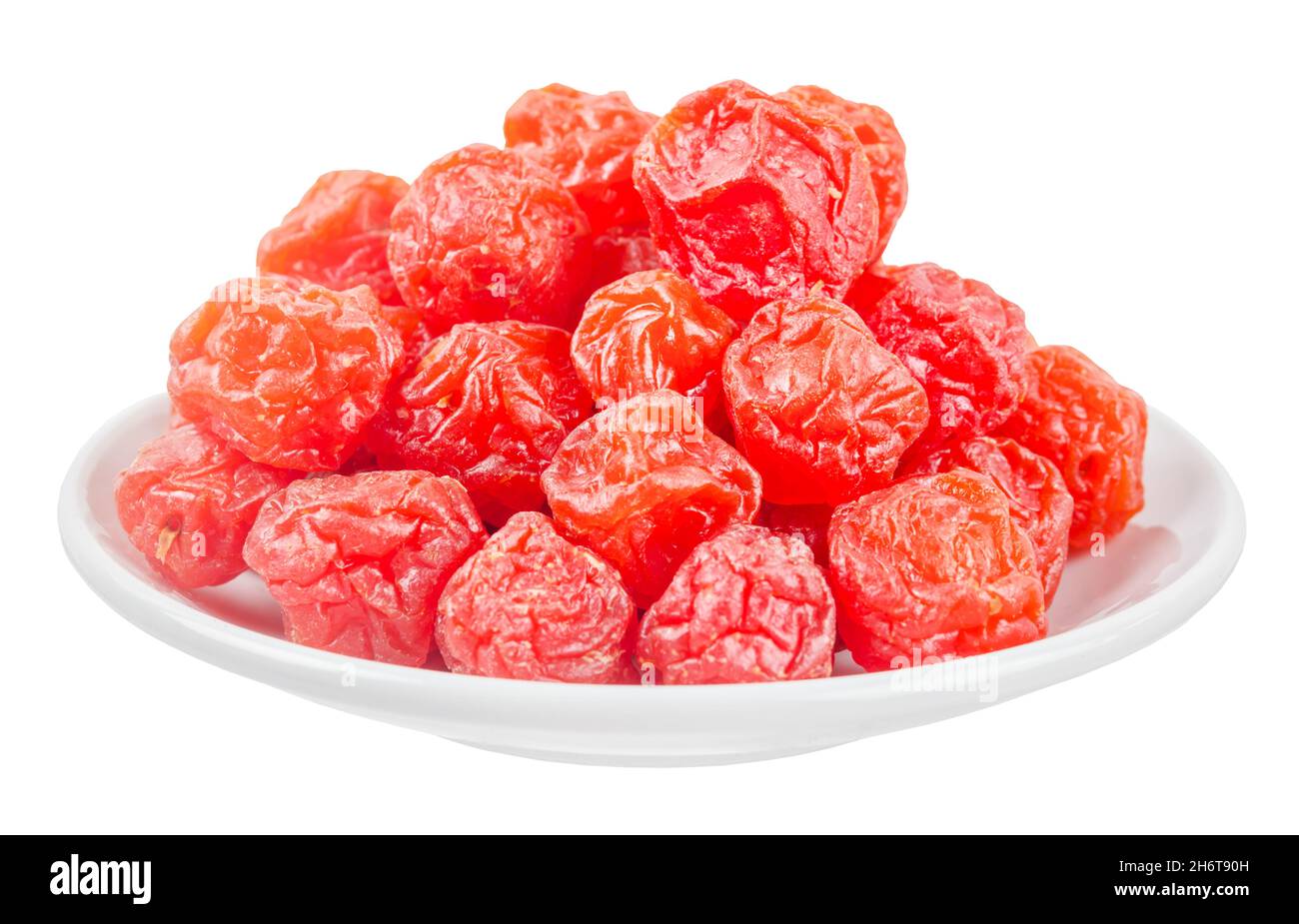 Dried red prunes fruits (Preserved fruits Chinese plum) in withe dishl