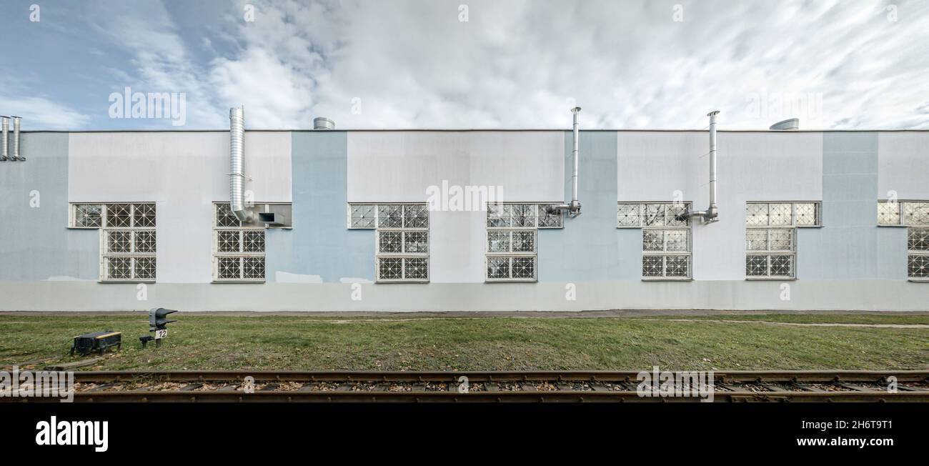modern industrial building with installed pipes of ventilation systems