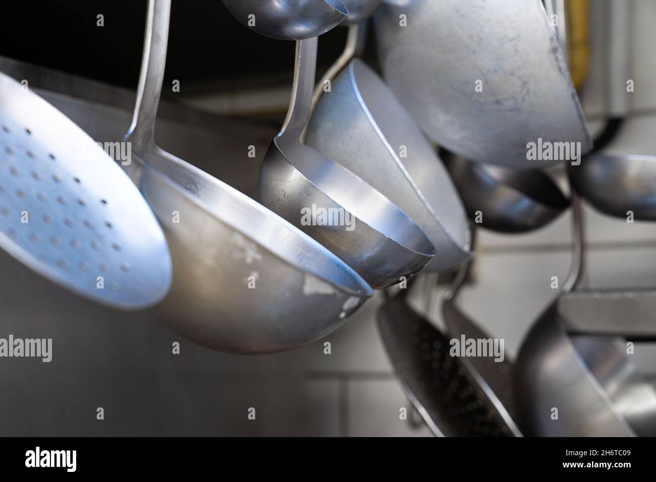 Selective of metal utensils in a kitchen of a French traditional pork