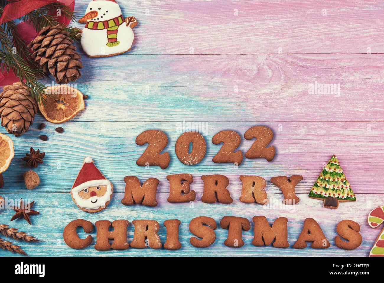 Theme For Christmas 2022 Gingerbread Cookies For New 2022 Year On Wooden Background, Xmas Theme  Stock Photo - Alamy