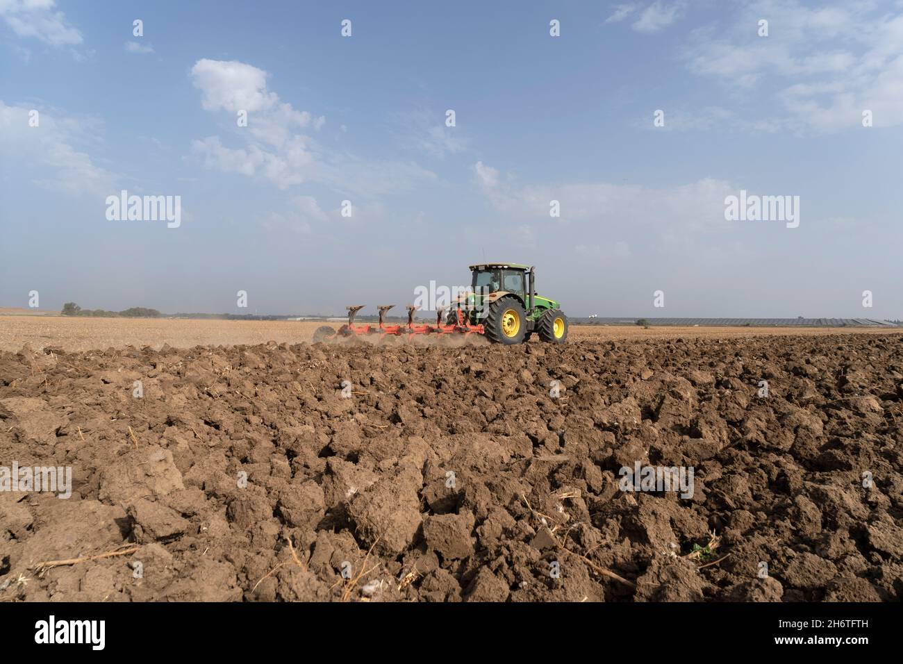 Tractor Plowed soil for sowing Stock Photo - Alamy
