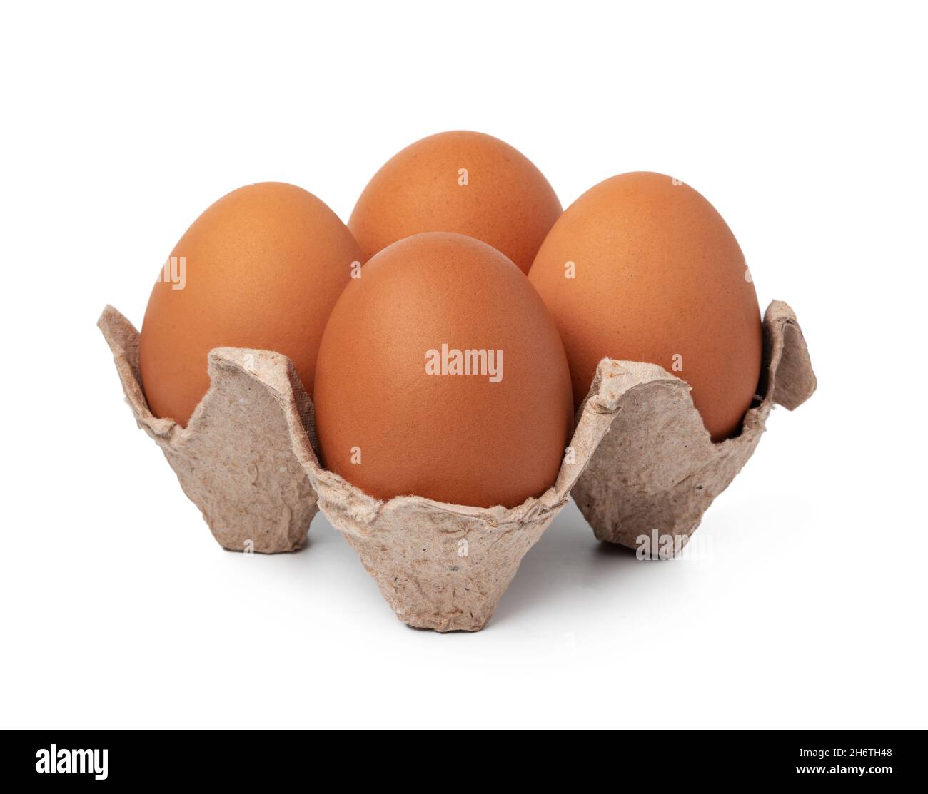 Eggs in basket isolated on white background Stock Photo - Alamy