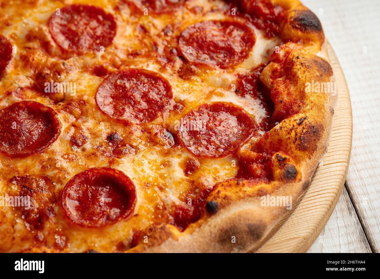 Fresh baked pepperoni pizza with salami Stock Photo - Alamy