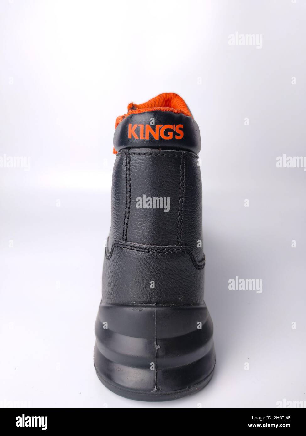 Malaysia, Perak, 17 October 2021: Kings brand safety shoes on a white background. Stock Photo