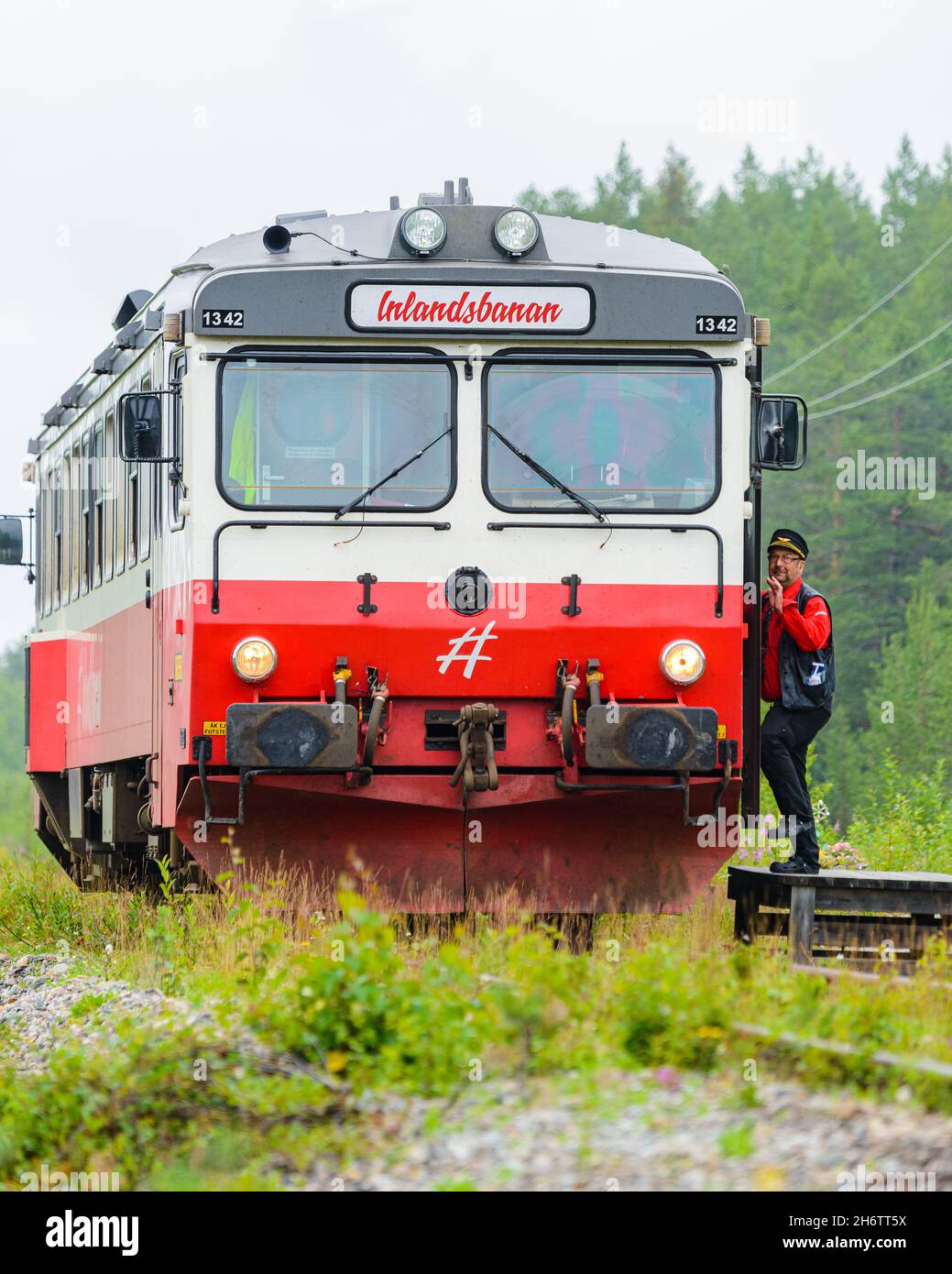 Train driver entering Stock Photo Alamy