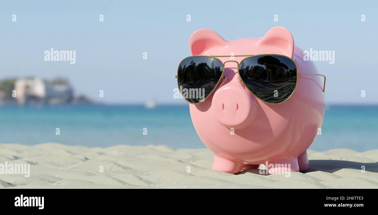 Piggy Bank With Sunglasses On The Beach Holiday Stock Photo