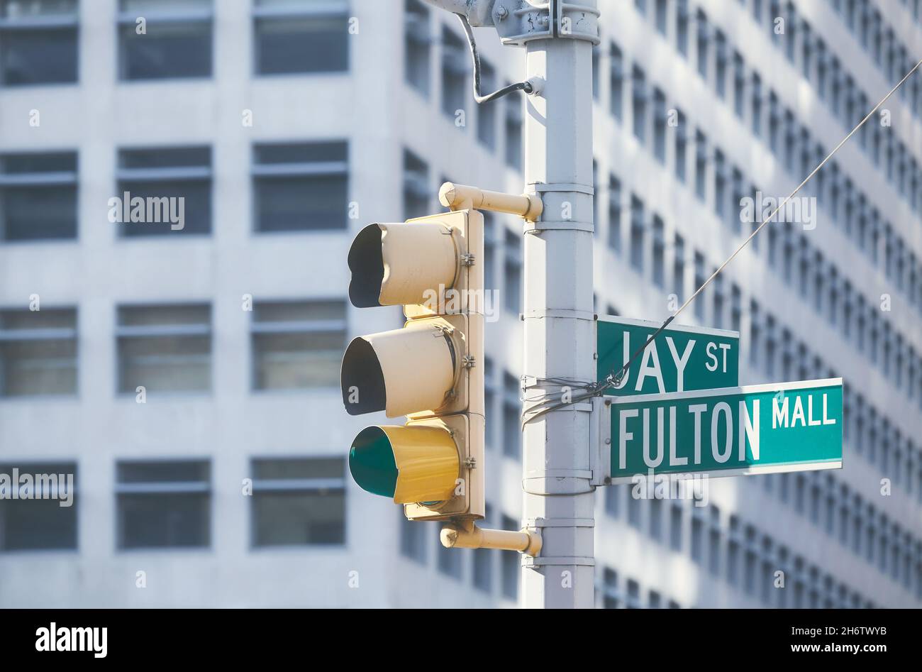Traffic lights and road signs at Jay and Fulton Street, color toning