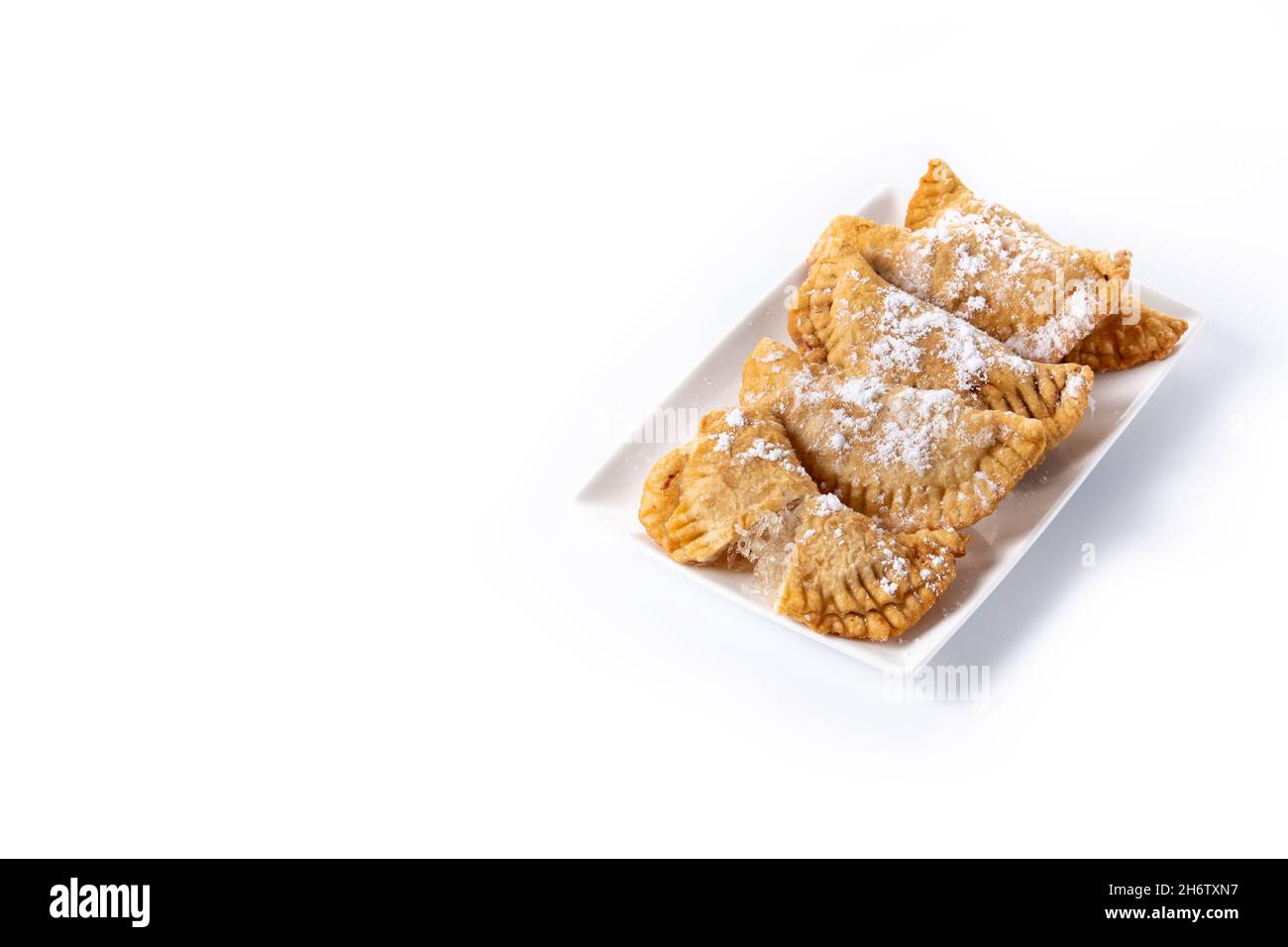 Spanish sweet stuffed pastry filled with angel hair isolated on white ...