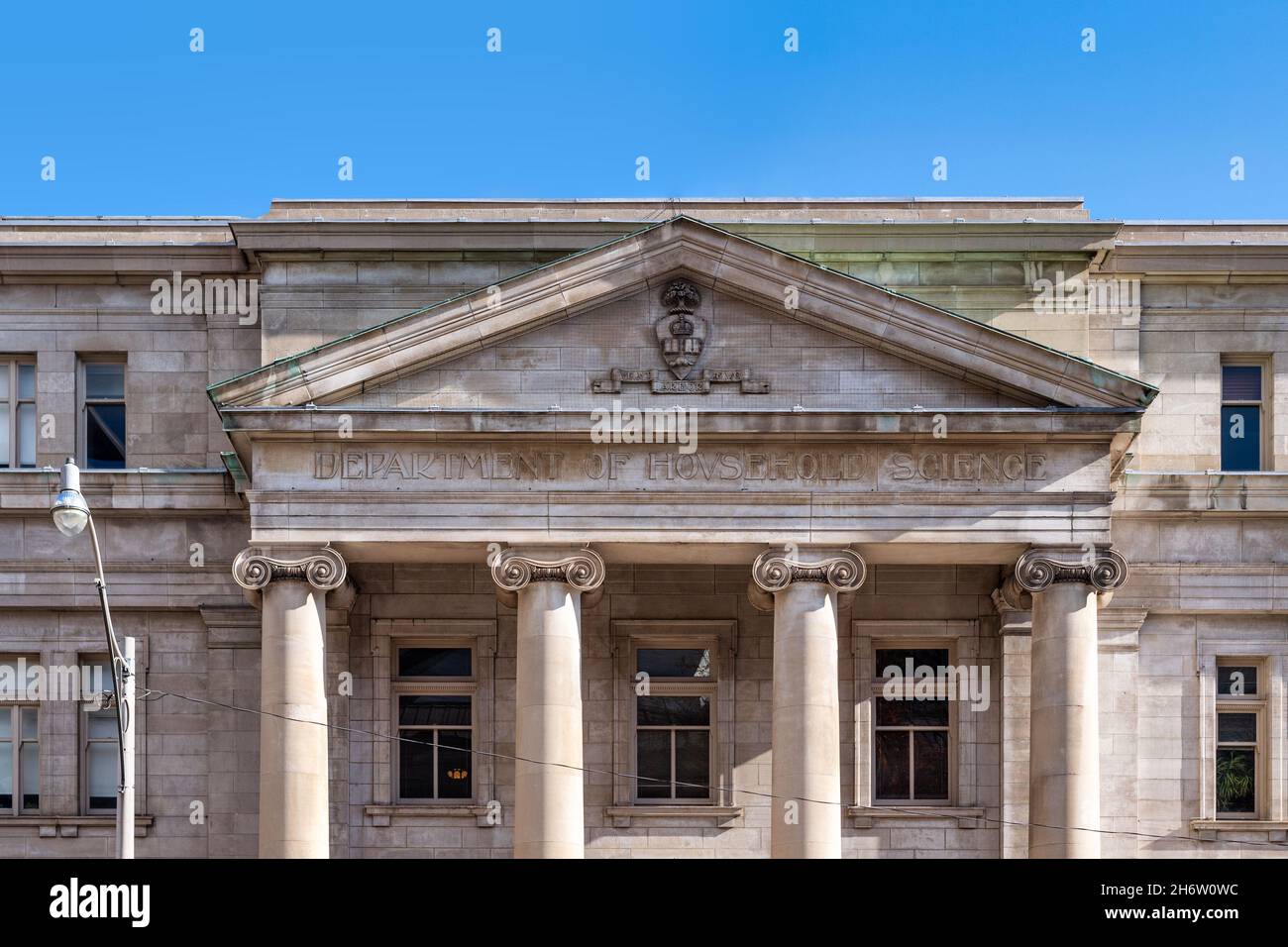 Facade of an old stone building with the inscription 'Department of Household Science' in the downtown district. Nov. 18, 2021 Stock Photo