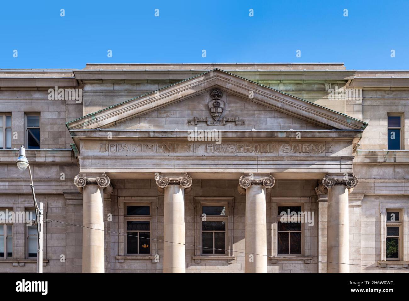 Facade of an old stone building with the inscription 'Department of ...