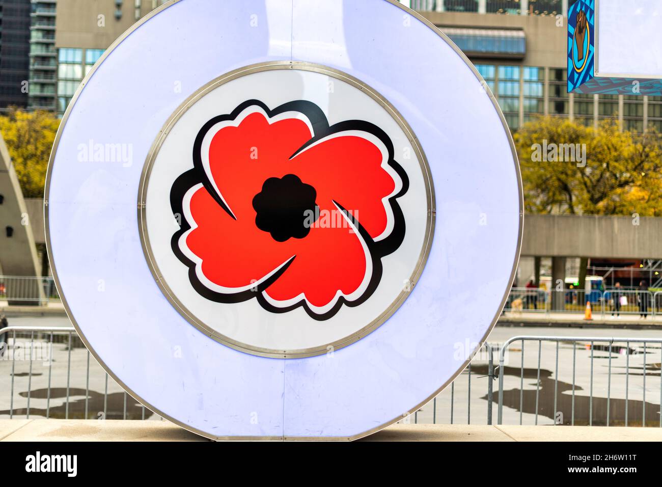 The poppy flower symbol decorating the 3d art of the Toronto sign as part of the Memorial Day celebrations.Nov. 18, 2021 Stock Photo