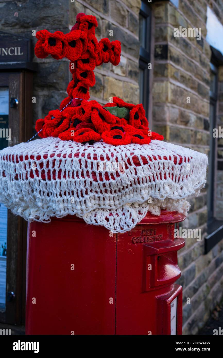 Royal Mail Postbox Adornment to commemorate the fallen of World War 11. Oldham, Greater Manchester, UK. Stock Photo
