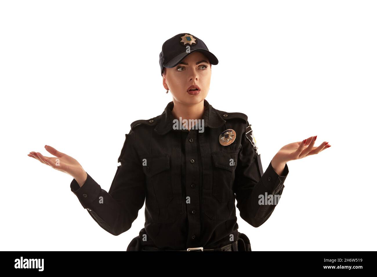 Close-up shot of a redheaded female police officer posing for the camera  isolated on white background Stock Photo - Alamy