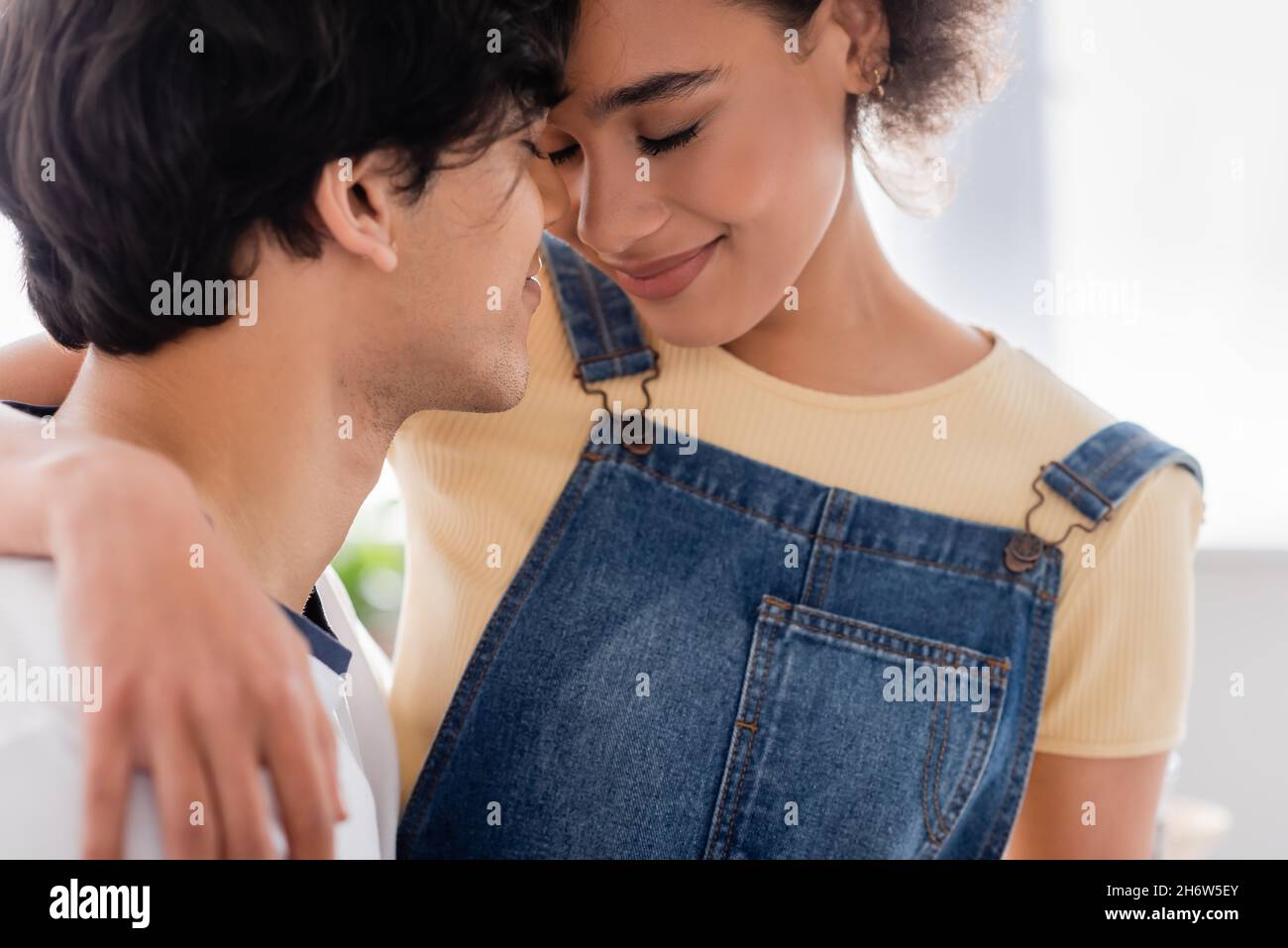 Home happy couple man woman hugging hi-res stock photography and images ...