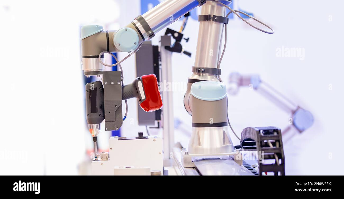 Automatic machine robot arm tool in manufacture factory. Concept smart ...