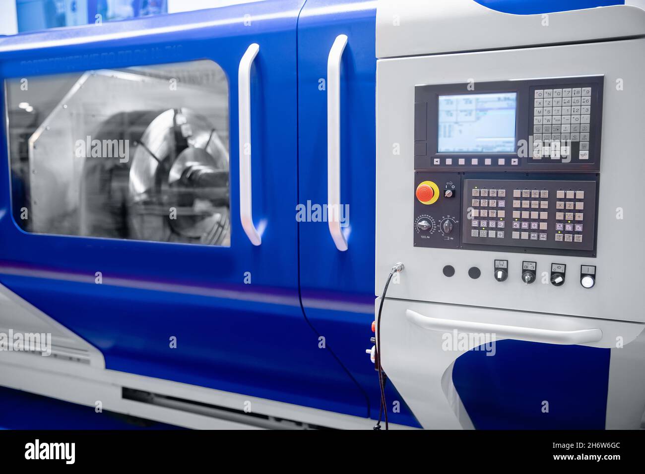 Modern control panel CNC metalworking machine. Industry automation factory mill drill technology work. Stock Photo
