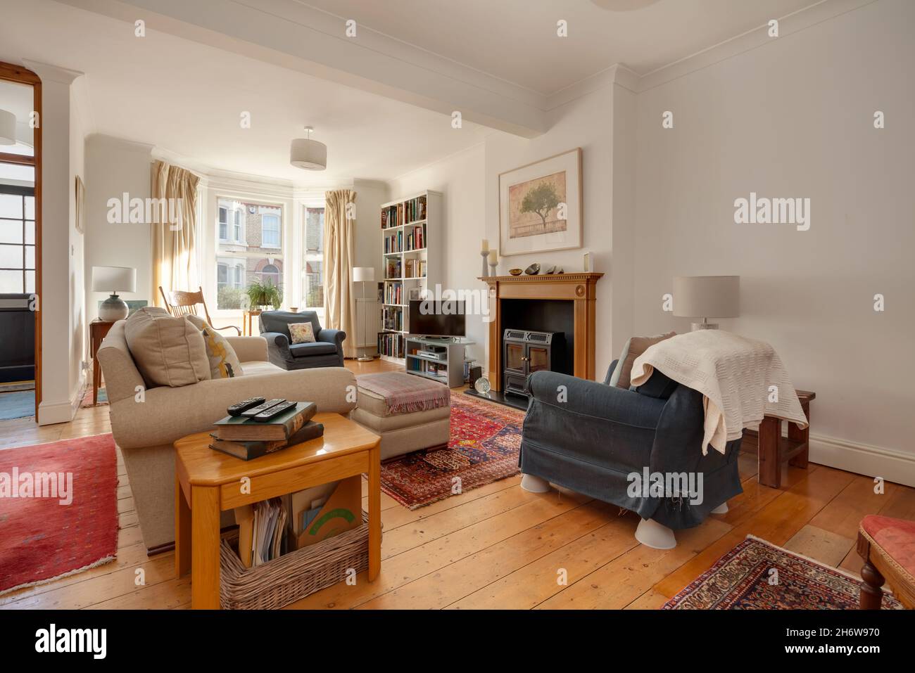 Cambridge, England - October 29 2019: Traditional bay fronted British living room retaining some original features including wooden floor Stock Photo