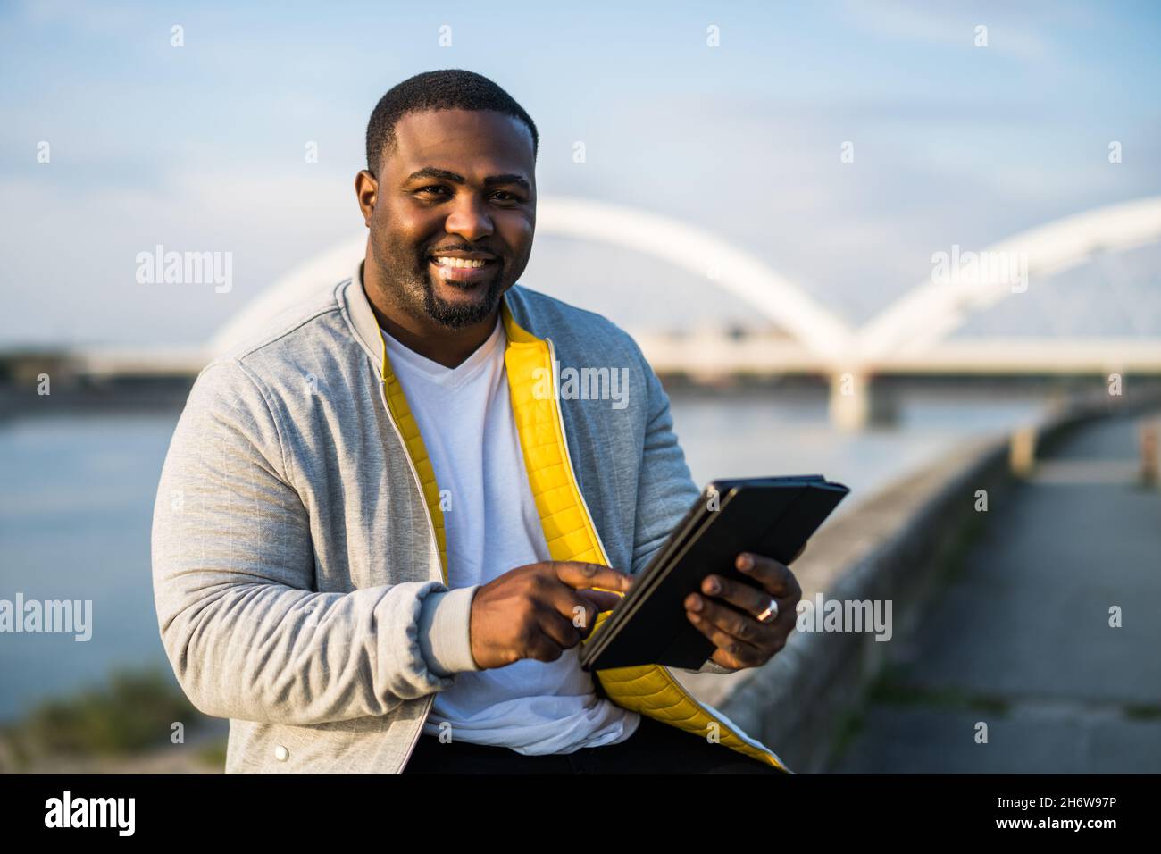 Outdoor tablet black man hi-res stock photography and images - Alamy