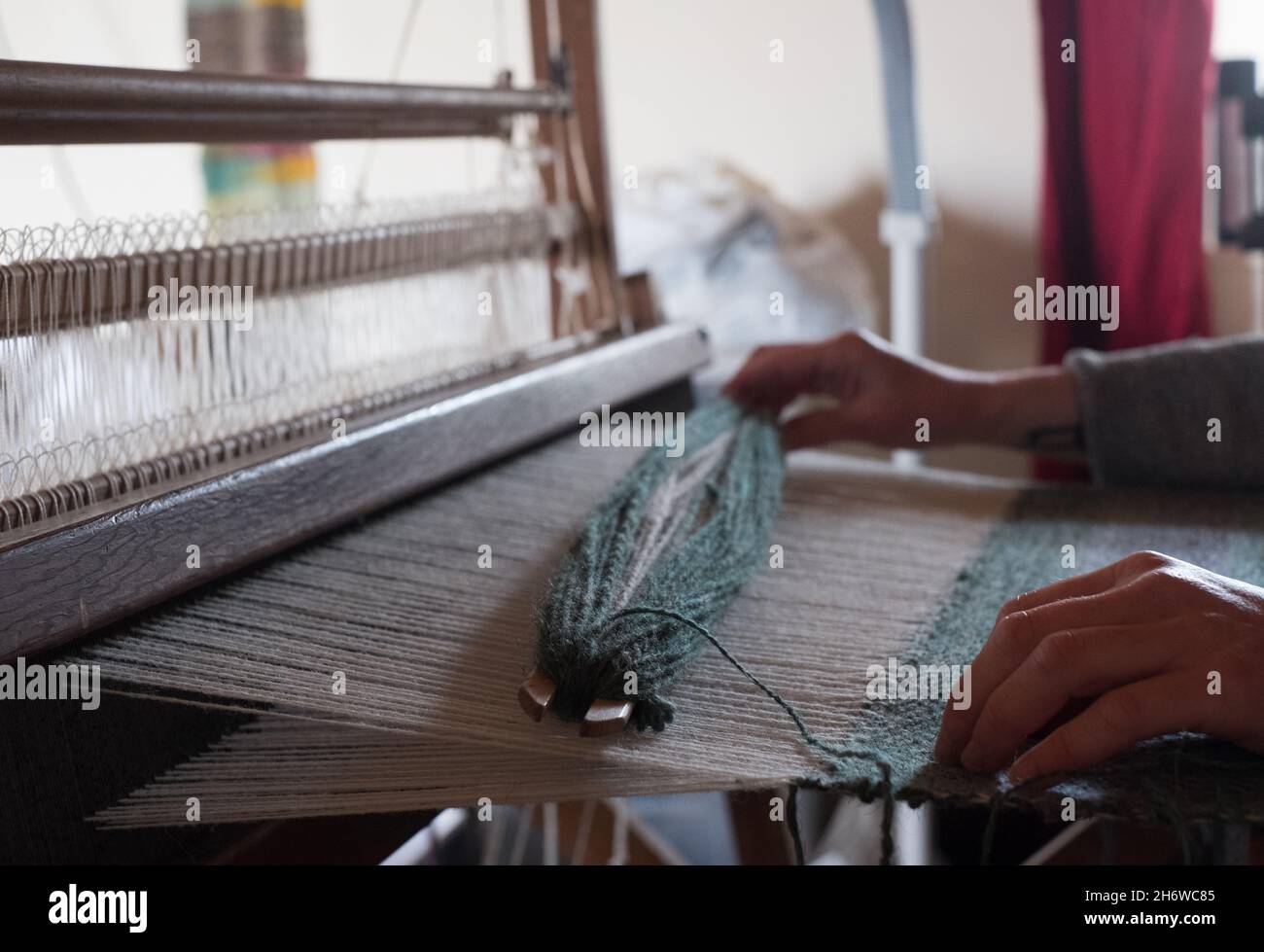 Weaving loom on North Ronaldsay, Orkney, Scotland, using wool from the island's semi-feral sheep Stock Photo