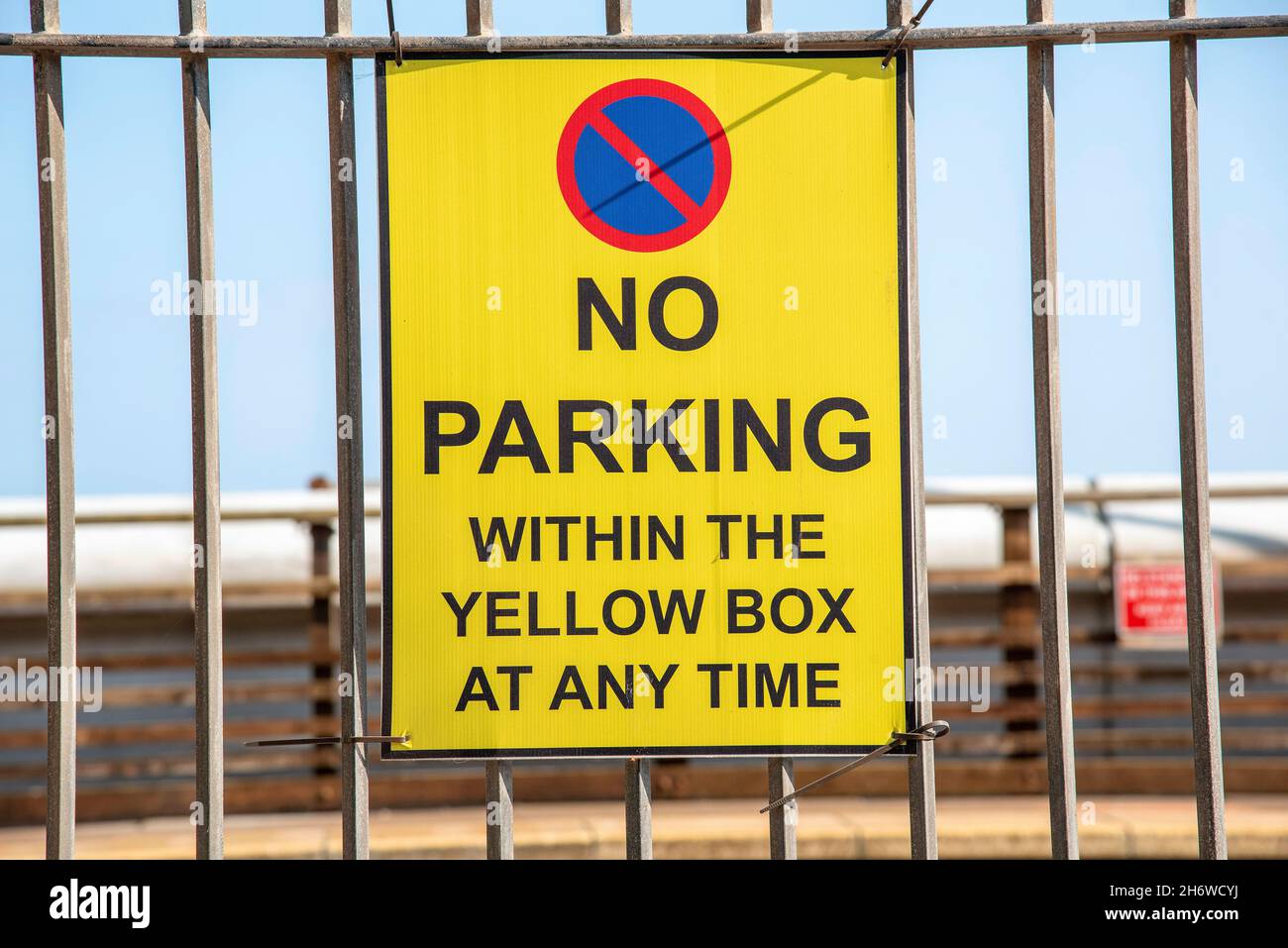 Devon, England, UK. 2021. Parking banned on yellow box used for vehicles turning sign in a Devon car park. Stock Photo