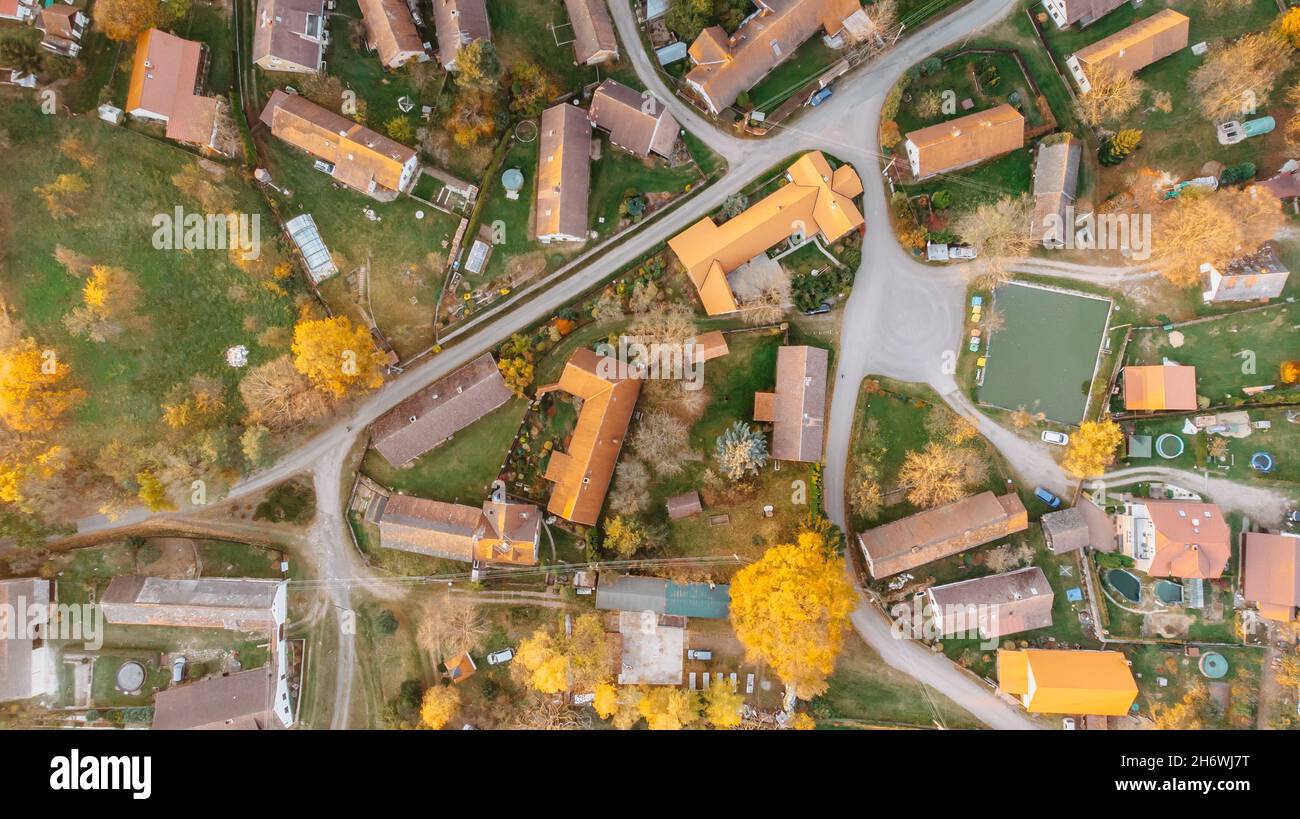 Aerial view of a small village.Top view of traditional housing estate in Czech. Looking straight down with a satellite image style.Houses from above Stock Photo